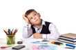 © Александр Кузнецов - Excellent pupil thinking over the puzzle sitting at the studing desk with white background