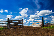 Gate From A Log On A Farm With A Beautiful Sky