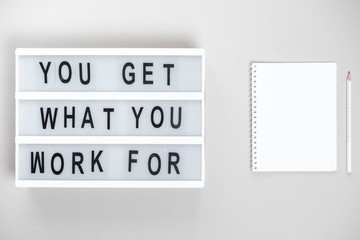 Motivational board and stationery. Business concept. Top view, flat lay