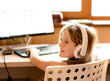 cheerful girl in headphones listens to music