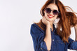 © SHOTPRIME STUDIO - Young beautiful woman in sunglasses on a white background, fashion, beauty, style