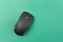  Computer Mouse On A Green Background