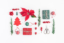 Christmas Composition. Christmas Poinsettia, Gifts, Pine Branches, Toys On White Background. Flat Lay, Top View