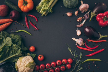 Wall Mural - top view of unprocessed vegetables on a gray table