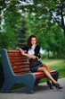 © Aliaksei Lasevich - beautiful girl sitting on bench in park
