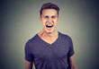 © pathdoc - portrait of a young angry man screaming