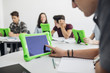 © LStockStudio - Students Using Technology