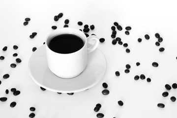 Coffee cup and beans on a white background.