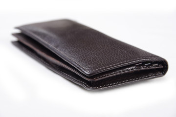 Dark brown wallet isolated