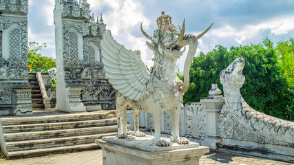 Lembuswana statue, Kutai's mythology animal who has head of lion with crown, elephant trunk, fish scales, and eagle wings in Hindus style temple, Pulau Kumala, Tenggarong, Indonesia