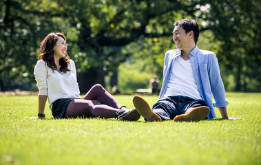 Wall Mural - Middle age couple spending time together in Tokyo on a sunny autumn day