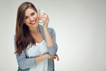 Young Smiling Woman Holding Water Glass. Isolated Studio Portrait