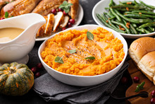 Mashed Sweet Potatoes On Thanksgiving Table