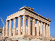 Early morning light and blue skies illuminate the Parthenon a top the Acropolis in Athens, Greece.