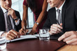 © Jacob Lund - Businesspeople having a meeting in office