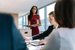 © Jacob Lund - Office workers discussing new business strategy