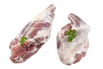 Fresh uncooked spring lamb shoulder and leg isolated on a white background