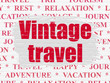 © Maksim Kabakou - Travel concept: Painted red text Vintage Travel on White Brick wall background with  Tag Cloud