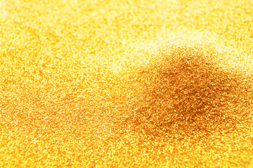 Wall Mural - Golden glitter pile, bright luxury background