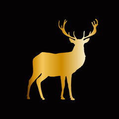 Gold silhouette of reindeer with big horns isolated on black background.