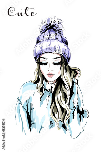 Beautiful Young Woman In Knitted Hat With Fur Pom Pom Hand