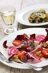 Wall Mural - radicchio rosso salad and fresh porcini mushroom risotto