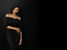Young Beautiful Woman Wearing Black Evening Dress