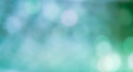 Wall Mural - green background with bokeh lights.