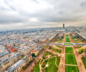 Fototapete - Paris aerial skyline with Champs de Mars on a cloudy winter day,