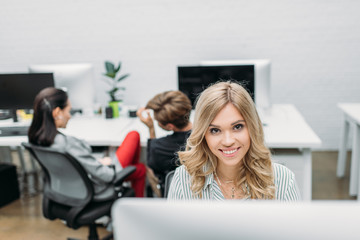 Wall Mural - young beautiful woman working with computer at modern office