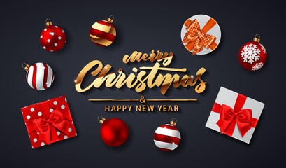 Wall Mural - Merry Christmas handwriting script lettering. Christmas congratulatory background with a gifts and balls