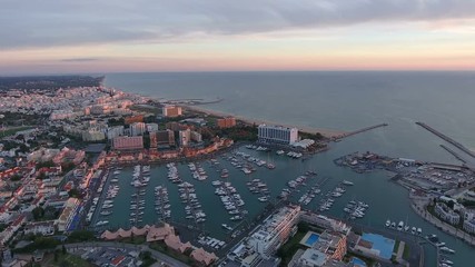 Canvas Print - Aerial. Tourist town of Vilamoura and the port with yachts, filmed from air. Portugal