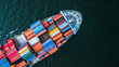 Aerial view from drone, Container cargo ship in import export business logistic and transportation of international by container cargo ship in the open sea in Asia.