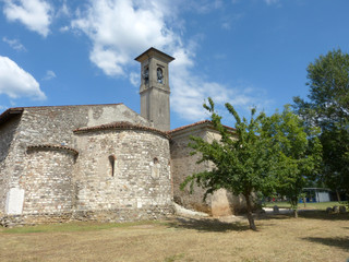 Wall Mural - The ancient church of the Romanesque Pieve of Pontenove spans the Brescia country - Italy 03