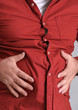 Overweight man in tight red shirt, closeup