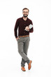 © Drobot Dean - Full length portrait of a happy confident man