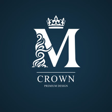 Elegant Letter M. Graceful Royal Style. Calligraphic Beautiful Logo. Vintage Drawn Emblem For Book Design, Brand Name, Business Card, Restaurant, Boutique, Hotel. Vector Illustration