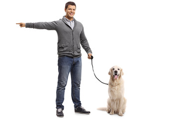 Wall Mural - Man with a labrador retriever pointing