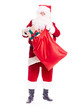 © Mediaphotos - Santa Claus putting Christmas gift into red sack on white background
