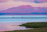 Fototapeta  - Song Kul lake with horses in sunrise