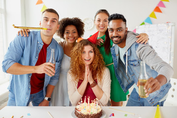 Wall Mural - happy coworkers with cake at office birthday party