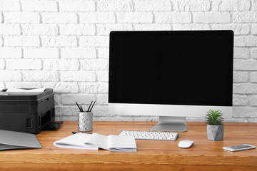 Poster - Comfortable workplace with computer monitor on table in office