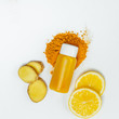 Ginger shot healthy drink with curd in a plastic bottle on white background. Immunity Boosting Tonic. Top view