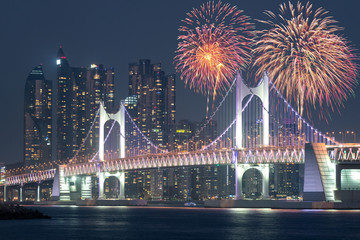 New Year Fireworks show at Gwangan Bridge with Busan city in background at Busan, South Korea.