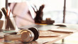 © jakkaje8082 - Closeup headphone with blurred laptop computer and equipment in design studio creativity ideas or modern graphic designer workplace background