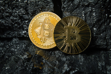 Bitcoin is a gold coin. The concept of crypto currency. Virtual currency background. coal mining, mining.