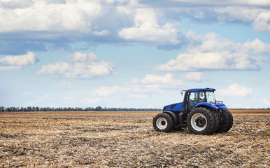 Poster - Tractor working in the field
