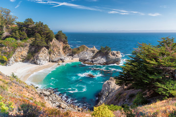 Wall Mural - Fine beach and falls on Pacific coast, Julia Pfeiffer beach and McWay Falls, Big Sur. California, USA.