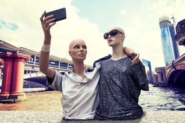 pair of dummies tourists take a selfie