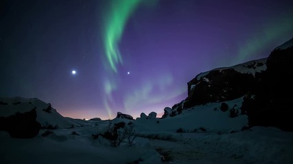 Wall Mural - aurora borealis moving over snow covered volcanic terrain reykjavik iceland.mov